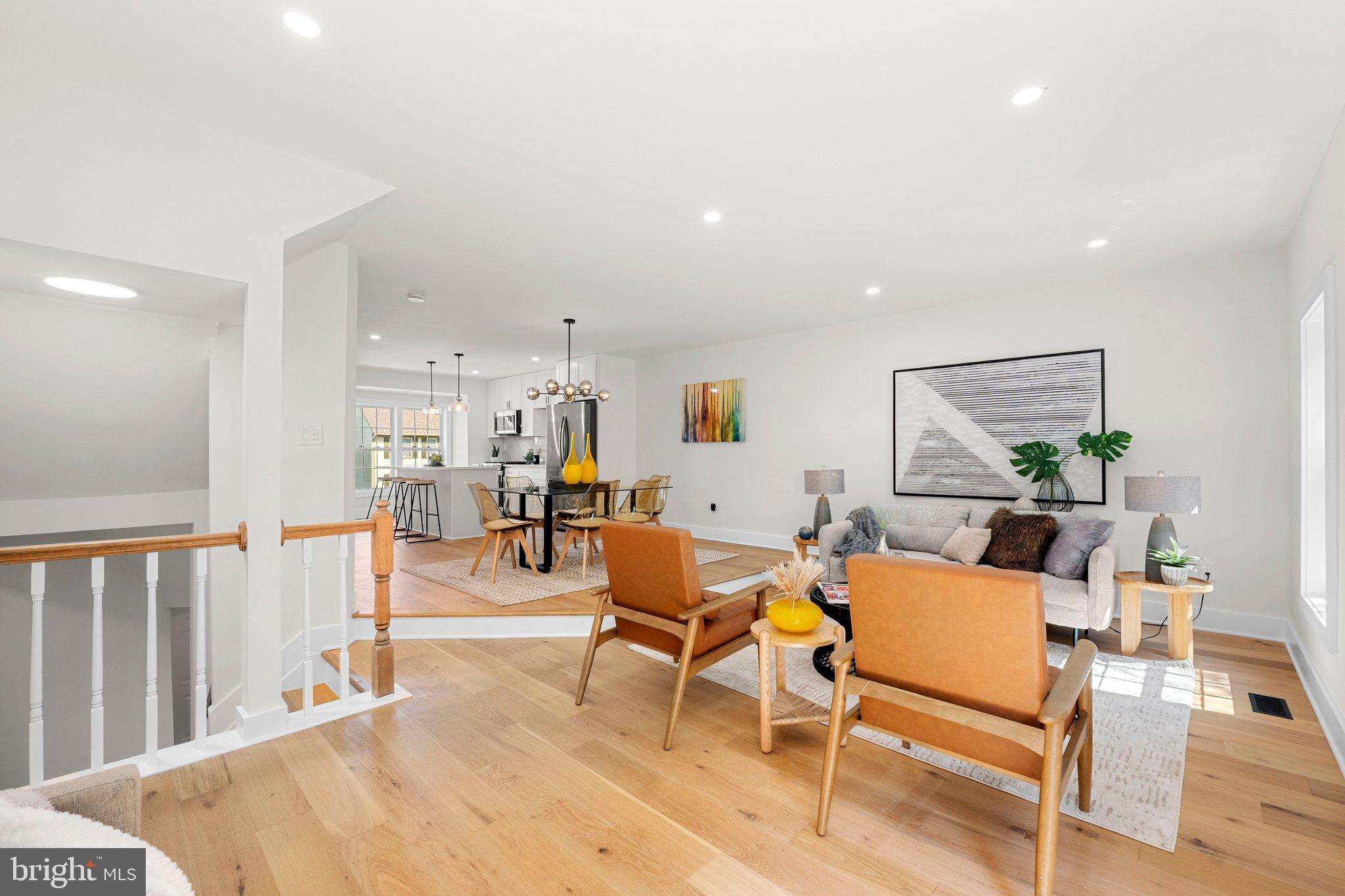 6213 Manchester Way Elkridge, MD 21075 - Photo 7 of 31 a living room with furniture and a table
