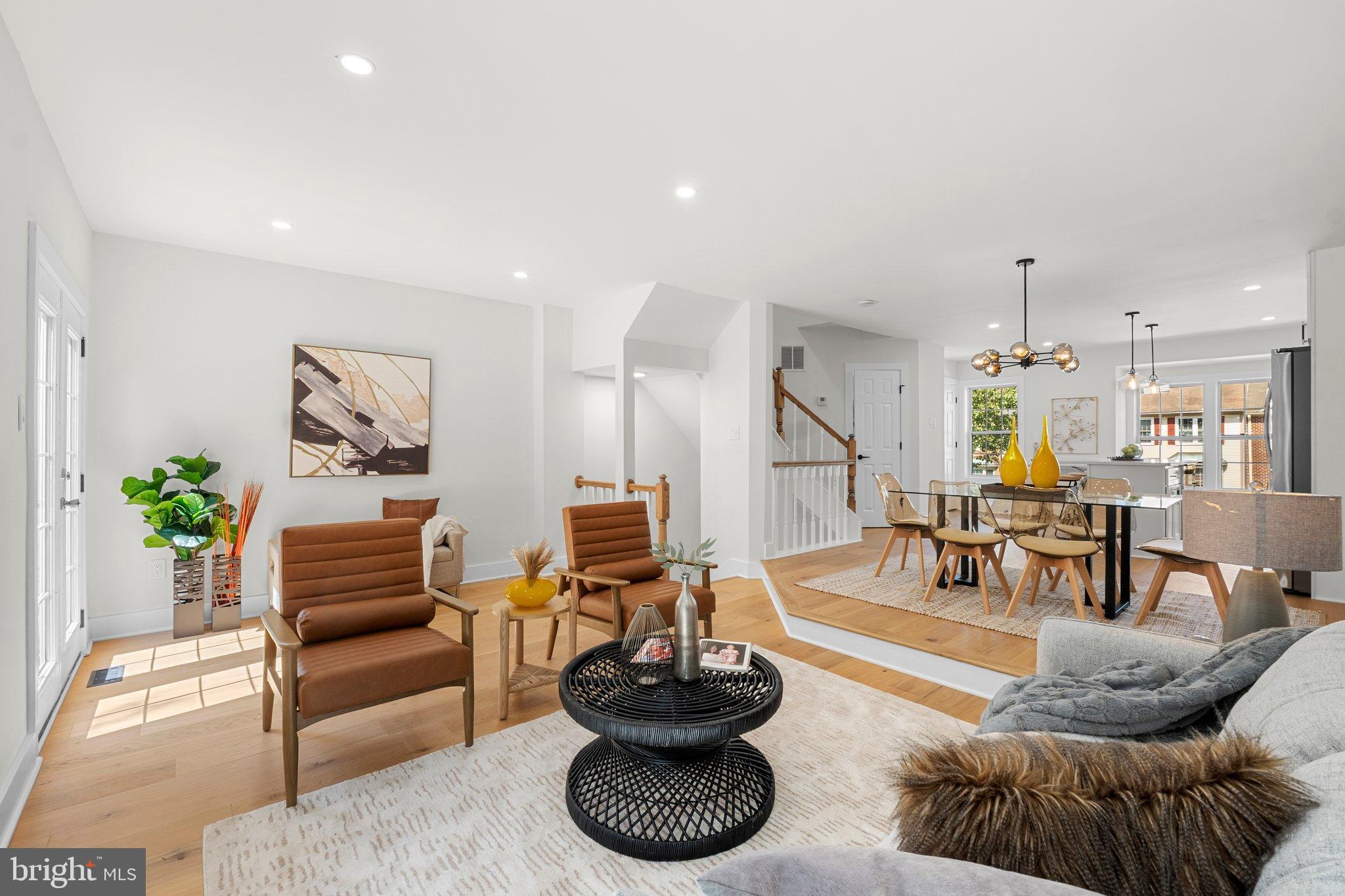 6213 Manchester Way Elkridge, MD 21075 - Photo 8 of 31 a living room with furniture and a potted plant
