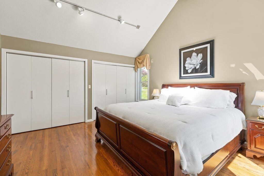 164 Marrett Road Lexington, MA 02421 - Photo 14 of 41 a bedroom with a bed and a window