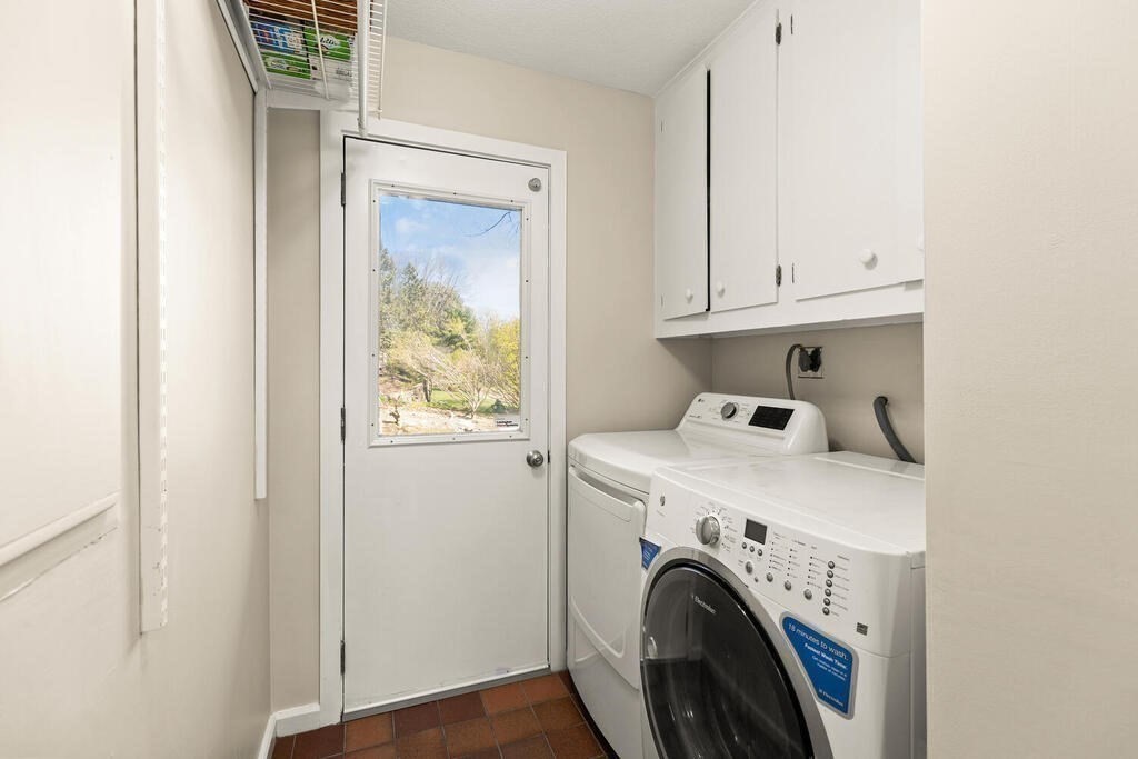164 Marrett Road Lexington, MA 02421 - Photo 22 of 41 a utility room with dryer and washer