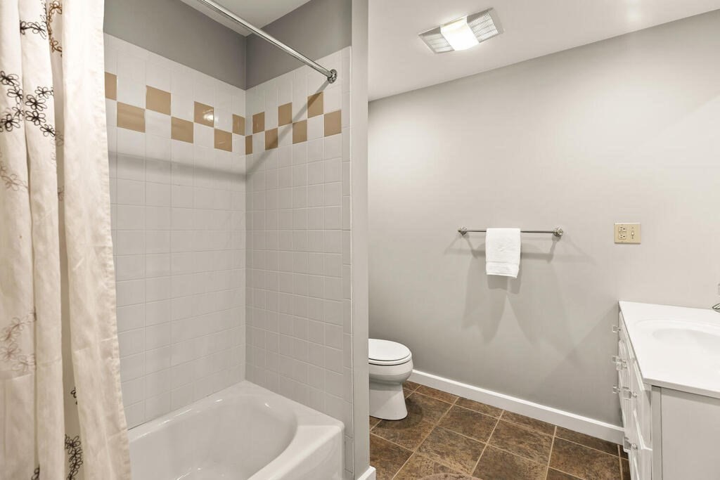 164 Marrett Road Lexington, MA 02421 - Photo 26 of 41 a bathroom with a toilet and shower