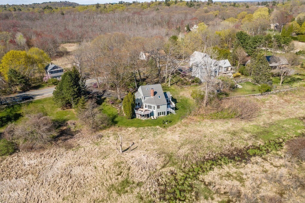 164 Marrett Road Lexington, MA 02421 - Photo 31 of 41 an aerial view of a house with a yard and large tree