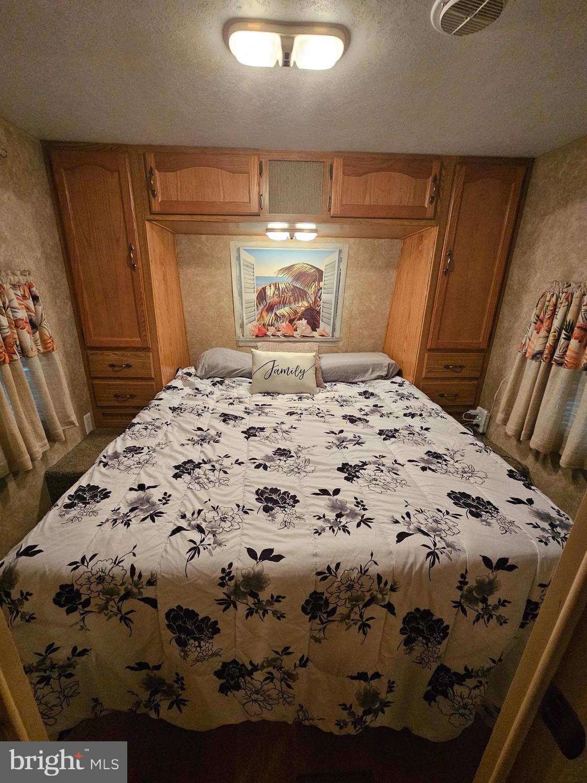 6 Boo Boo Boulevard Falling Waters, WV 25419 - Photo 13 of 43 a bedroom with a bed and a mirror