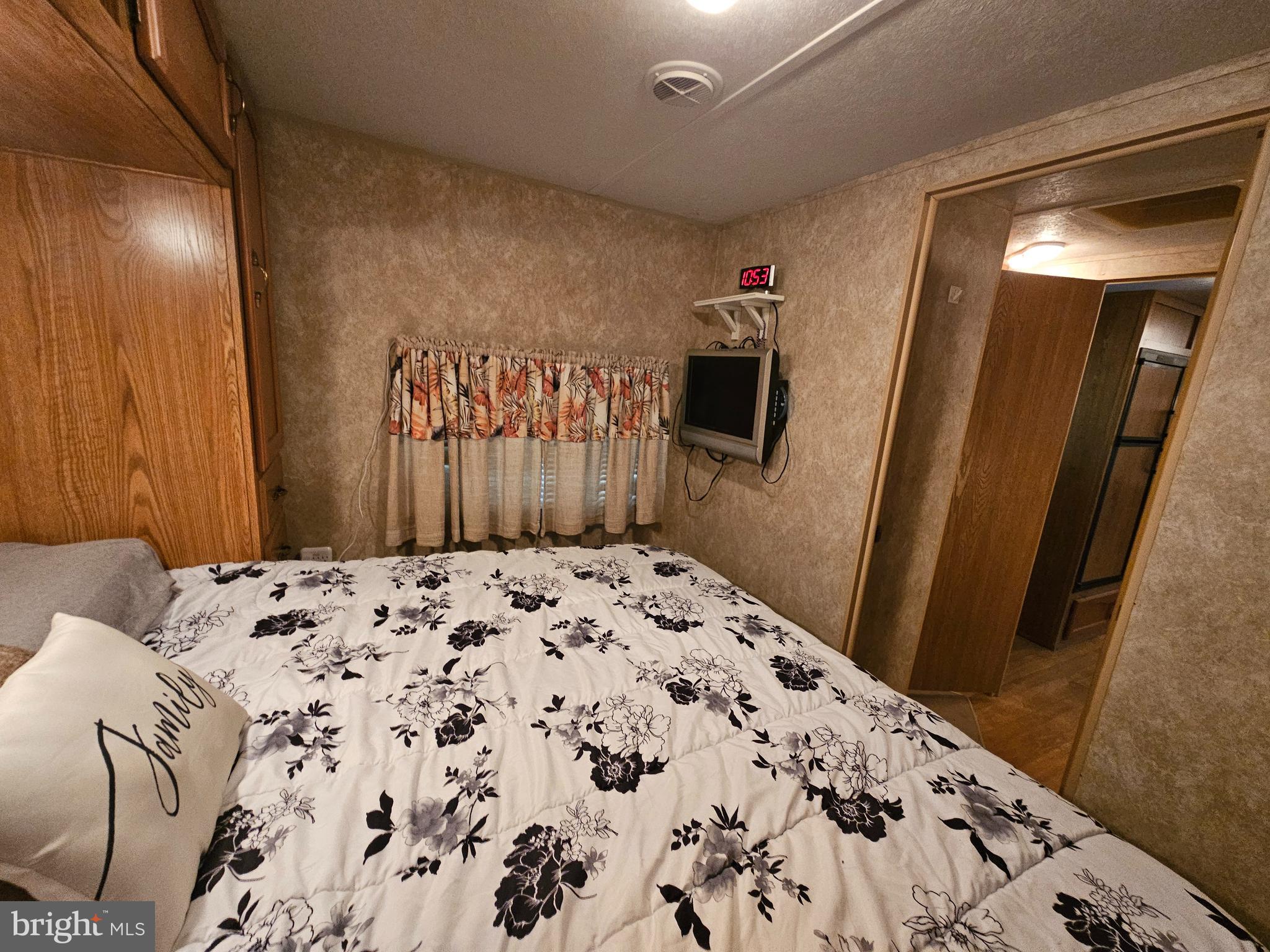 6 Boo Boo Boulevard Falling Waters, WV 25419 - Photo 14 of 43 a bedroom with a bed and a mirror