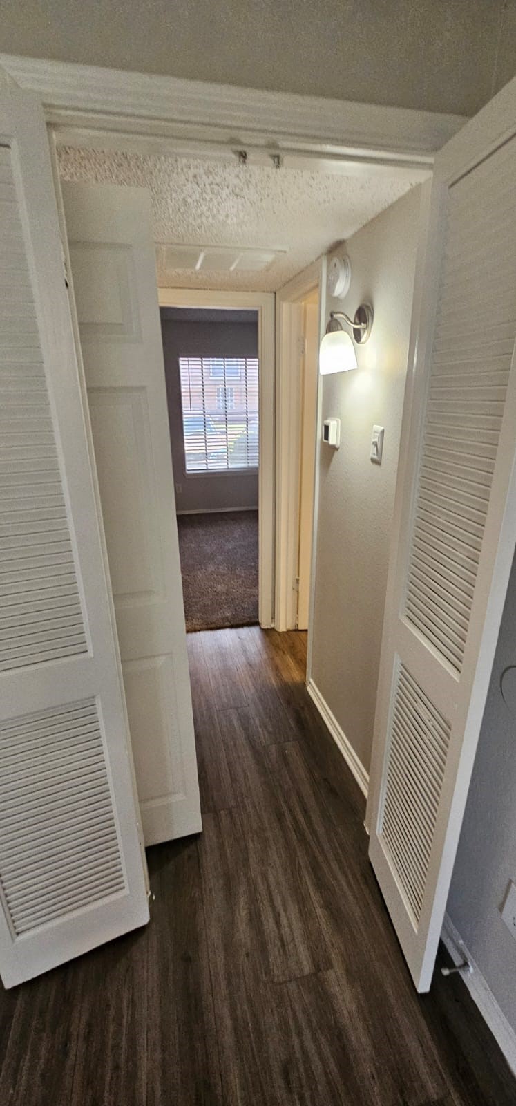 3737 Timberglen Road, Unit 2110 Dallas, TX 75287 - Photo 7 of 19 a view of entryway with wooden floor