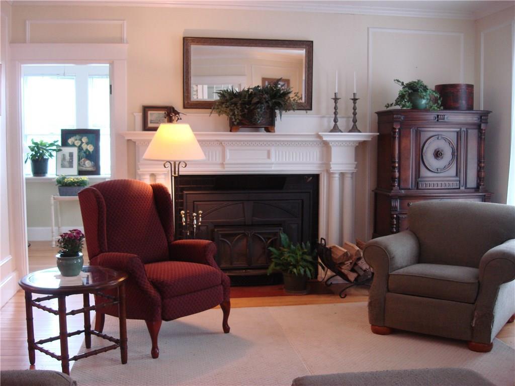 123 Winthrop Street Augusta, ME 04330 - Photo 14 of 35 Custom fireplace mantel with Jotul...
