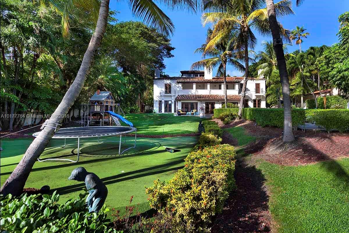4855 Pine Tree Drive Miami Beach, FL 33140 - Photo 2 of 26 a view of a park with plants and trees