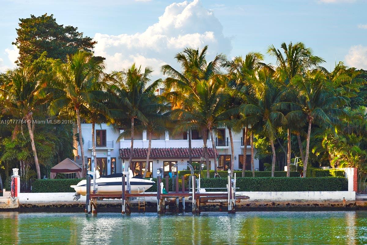 4855 Pine Tree Drive Miami Beach, FL 33140 - Photo 26 of 26 a view of house with swimming pool and a sitting area