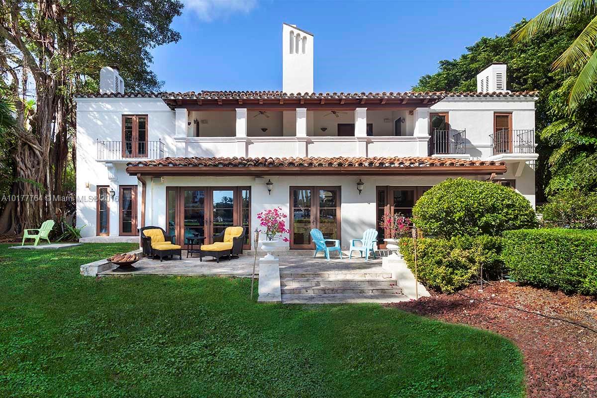 4855 Pine Tree Drive Miami Beach, FL 33140 - Photo 9 of 26 a view of a house with sitting area and garden