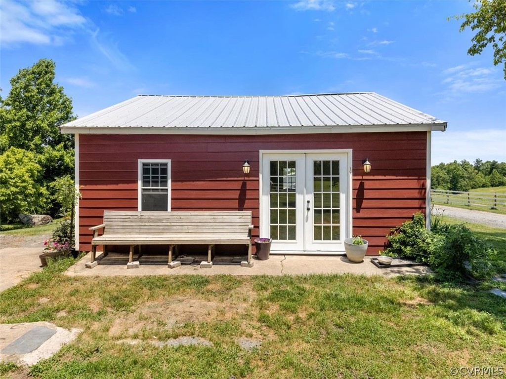 2278 High Rock Road Cumberland, VA 23040 - Photo 27 of 38 a front view of a house with a porch