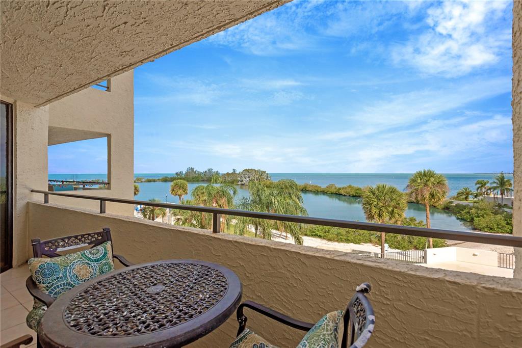 6009 Sea Ranch Drive, Unit 303 Hudson, FL 34667 - Photo 22 of 48 a view of a balcony with furniture