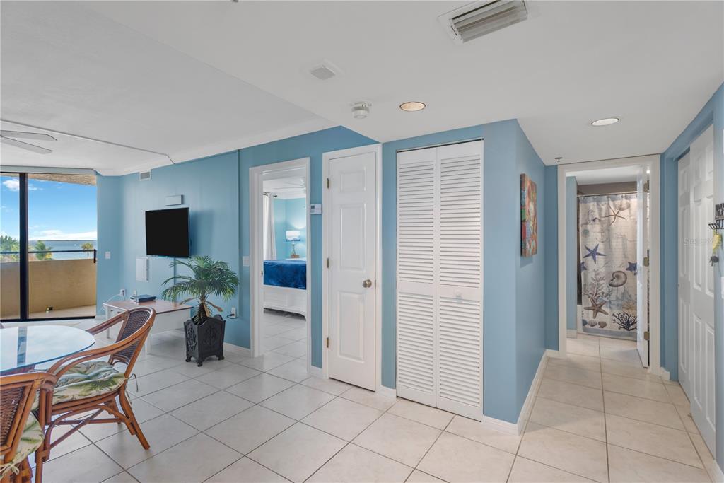 6009 Sea Ranch Drive, Unit 303 Hudson, FL 34667 - Photo 7 of 48 a living room with furniture and a flat screen tv