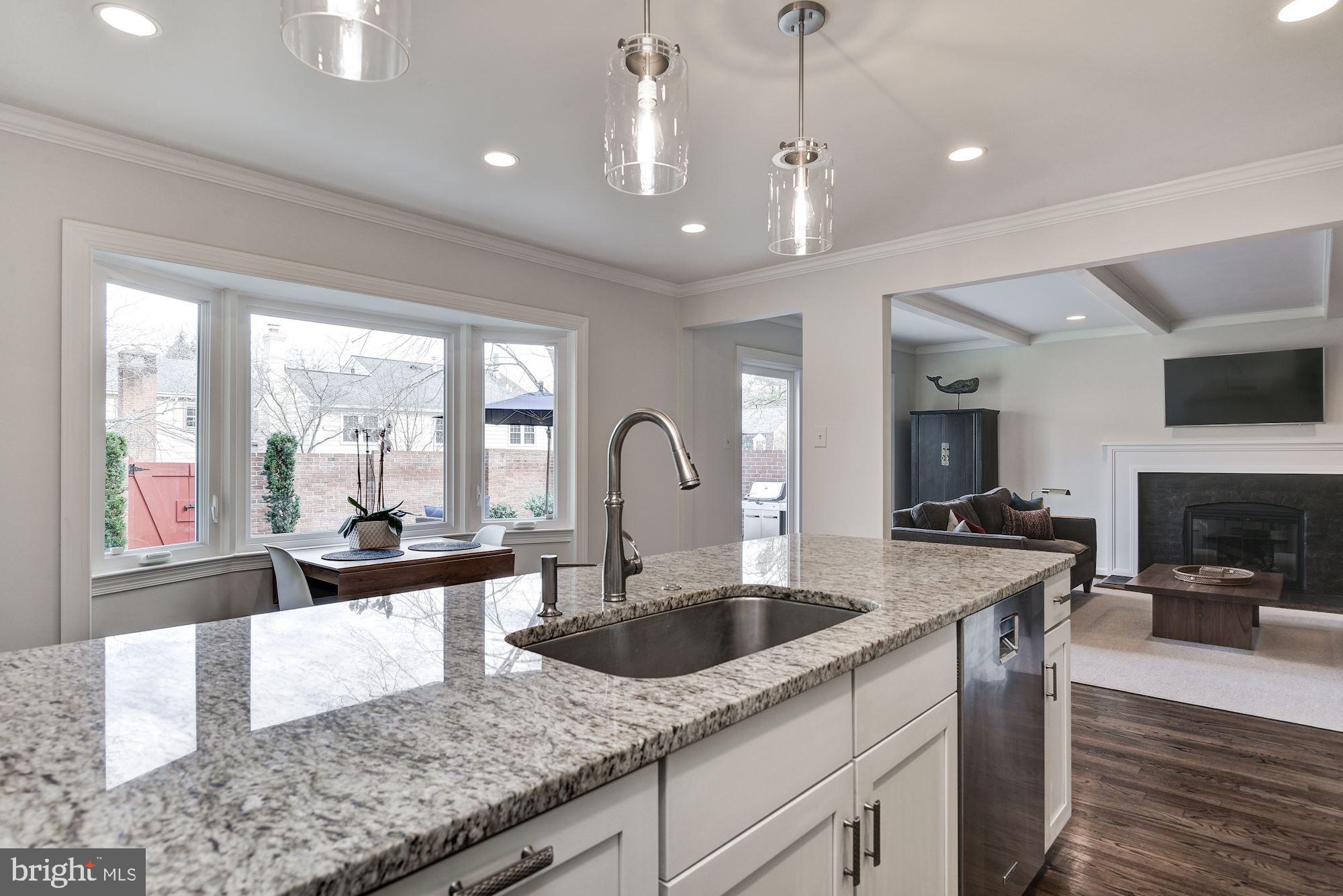 10237 Gainsborough Road Potomac, MD 20854 - Photo 11 of 40 Granite countertops & pendant lighting