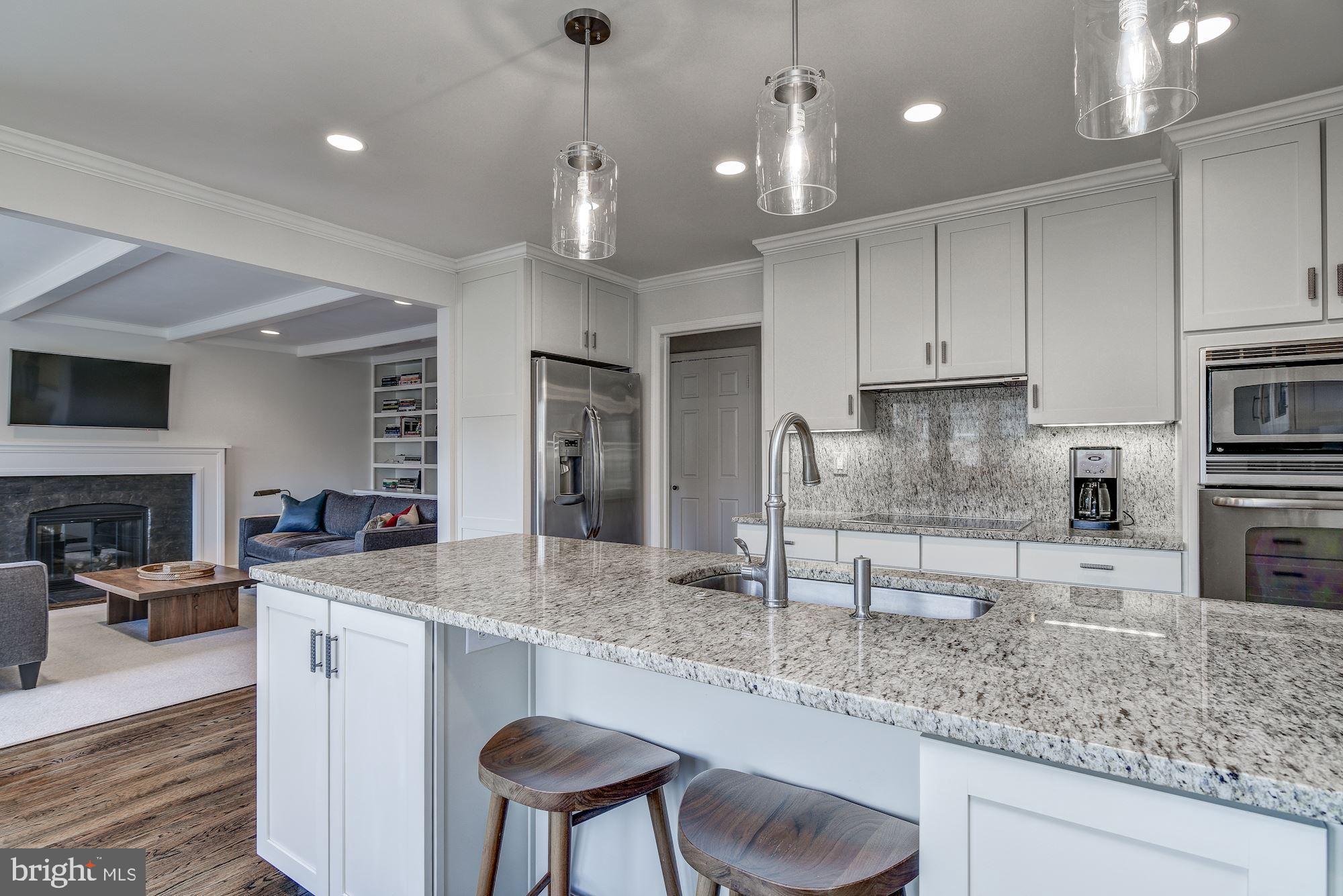 10237 Gainsborough Road Potomac, MD 20854 - Photo 17 of 40 Additional dining space at the island