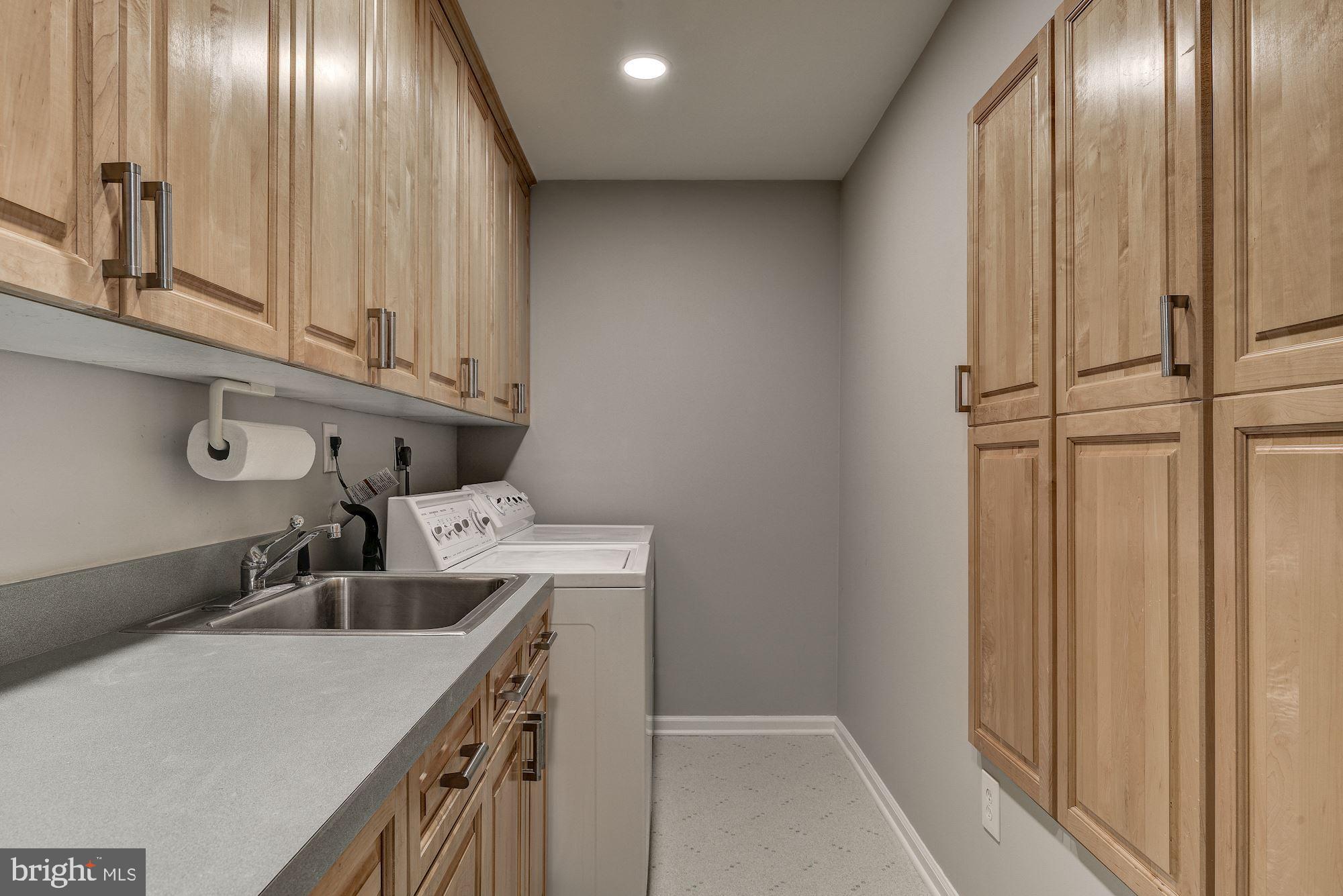 10237 Gainsborough Road Potomac, MD 20854 - Photo 34 of 40 Main-level laundry room
