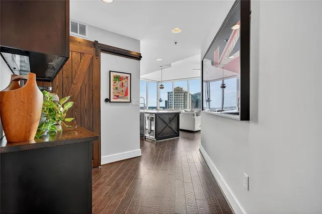 a spacious bathroom with a double vanity sink and a mirror