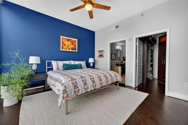 a swimming pool with outdoor seating and yard