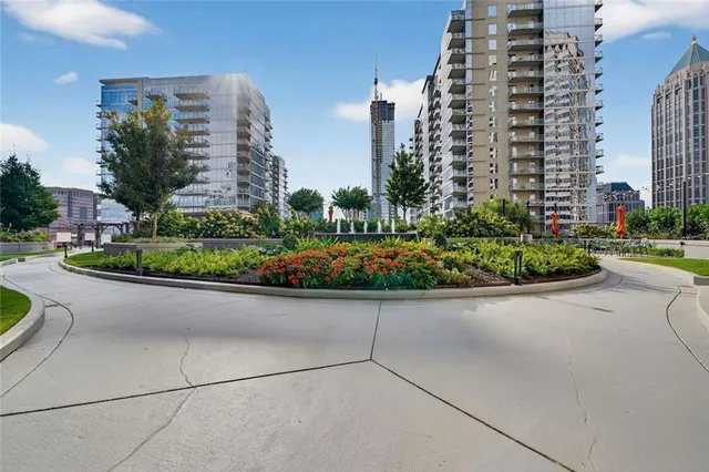 a view of outdoor space with wooden floor and wall painting