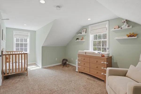 a room with furniture and a window