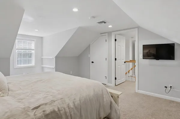 a view of a livingroom with a flat screen tv
