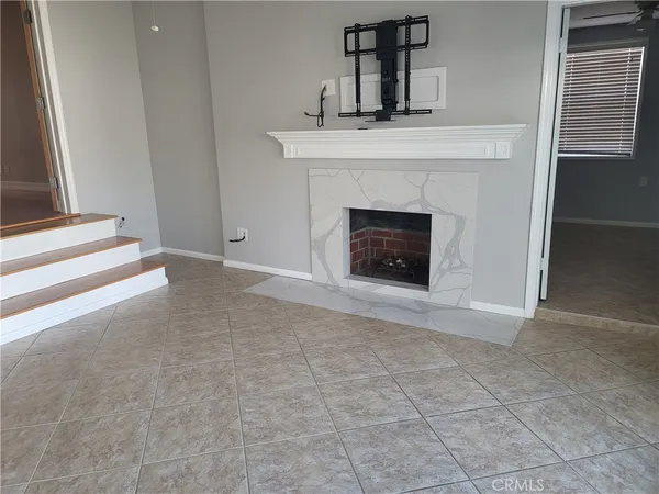 a view of a livingroom with a fireplace