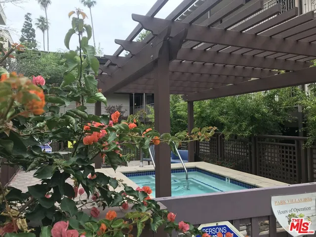 a view of a chairs and tables in the patio