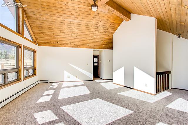3780 Range View Road Monument, CO 80132 - Photo 7 of 33 Main level living room.