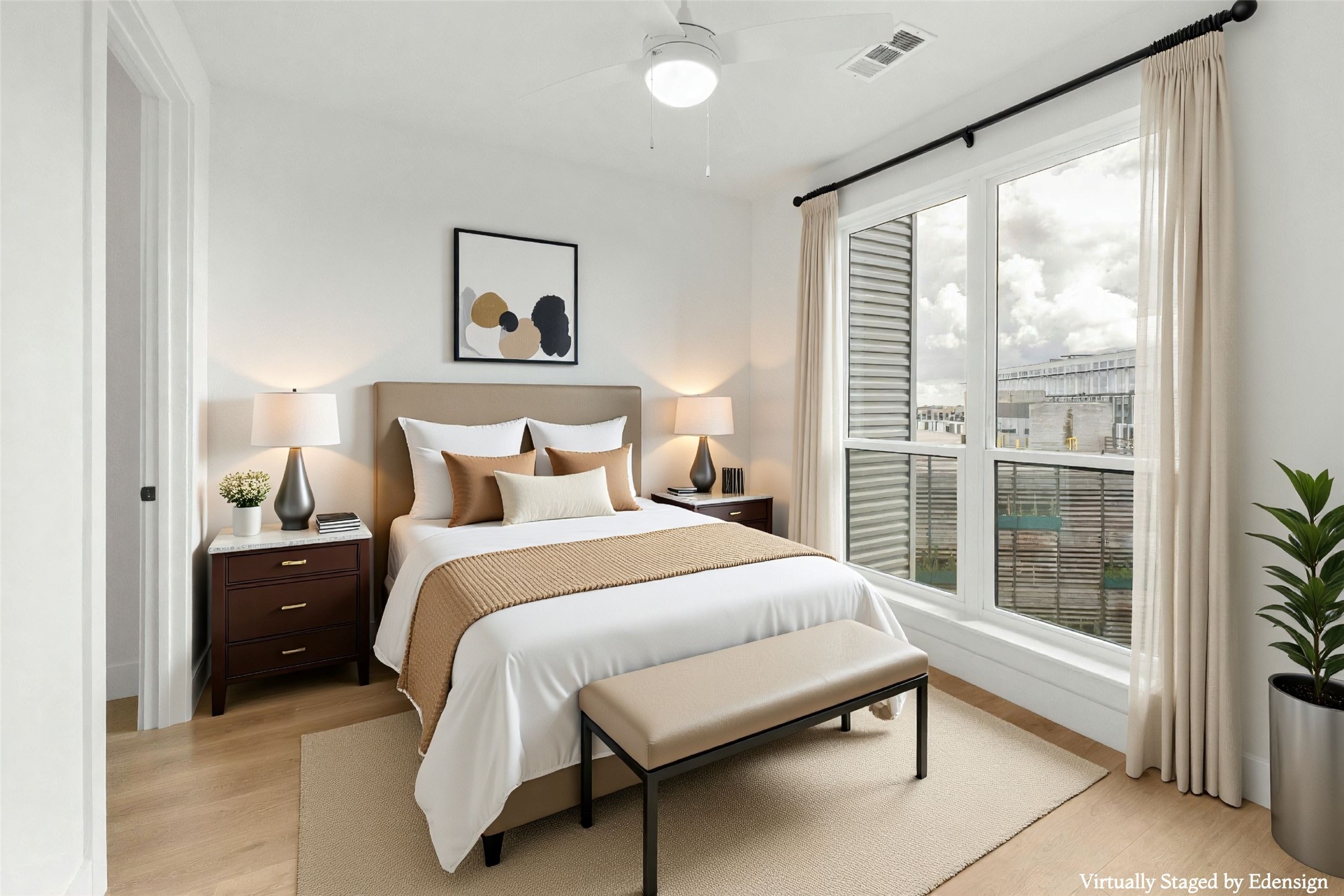 1701 Simond Avenue, Unit 644 Austin, TX 78723 - Photo 13 of 40 a bedroom with a bed and a large window