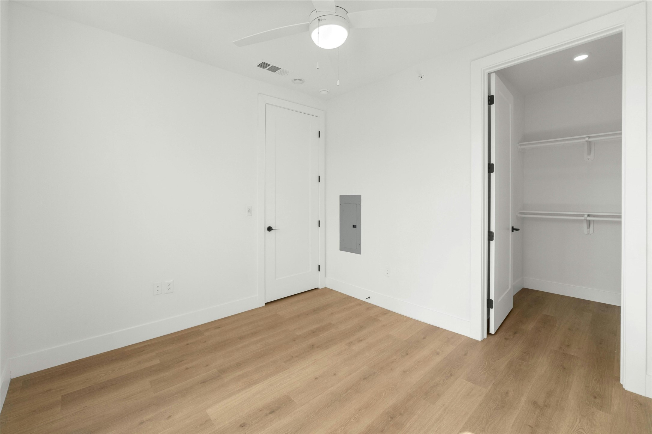 1701 Simond Avenue, Unit 644 Austin, TX 78723 - Photo 16 of 40 wooden floor in an empty room