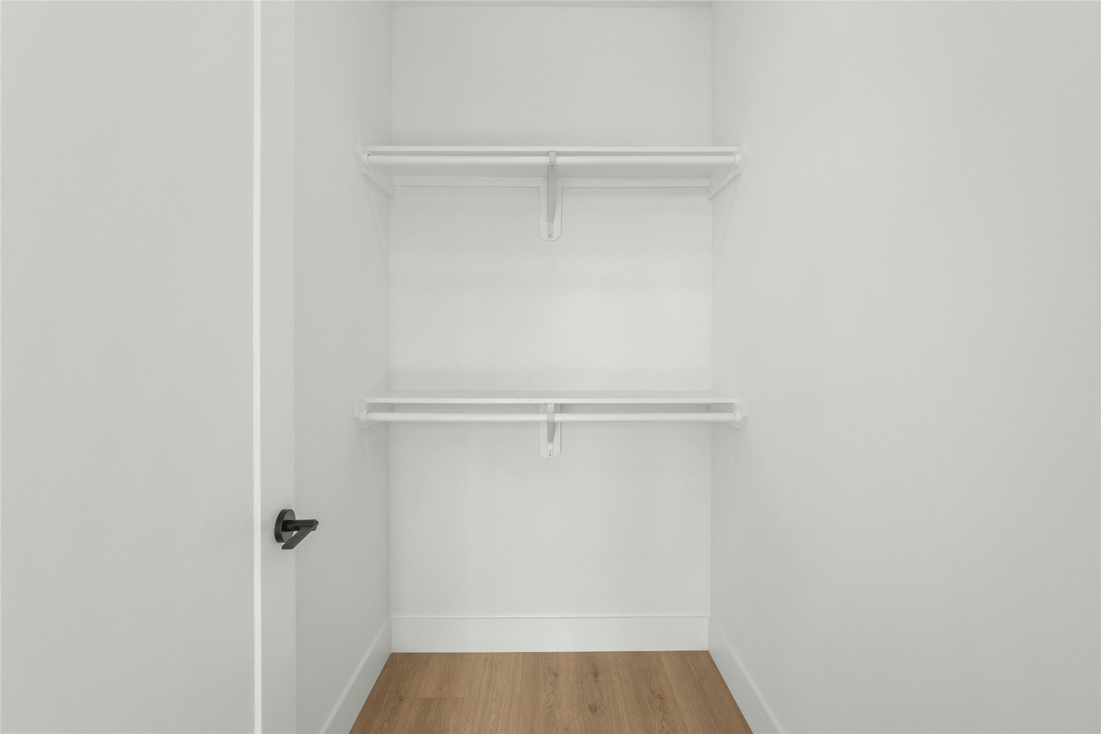 1701 Simond Avenue, Unit 644 Austin, TX 78723 - Photo 17 of 40 a view of a room with racks on the wall