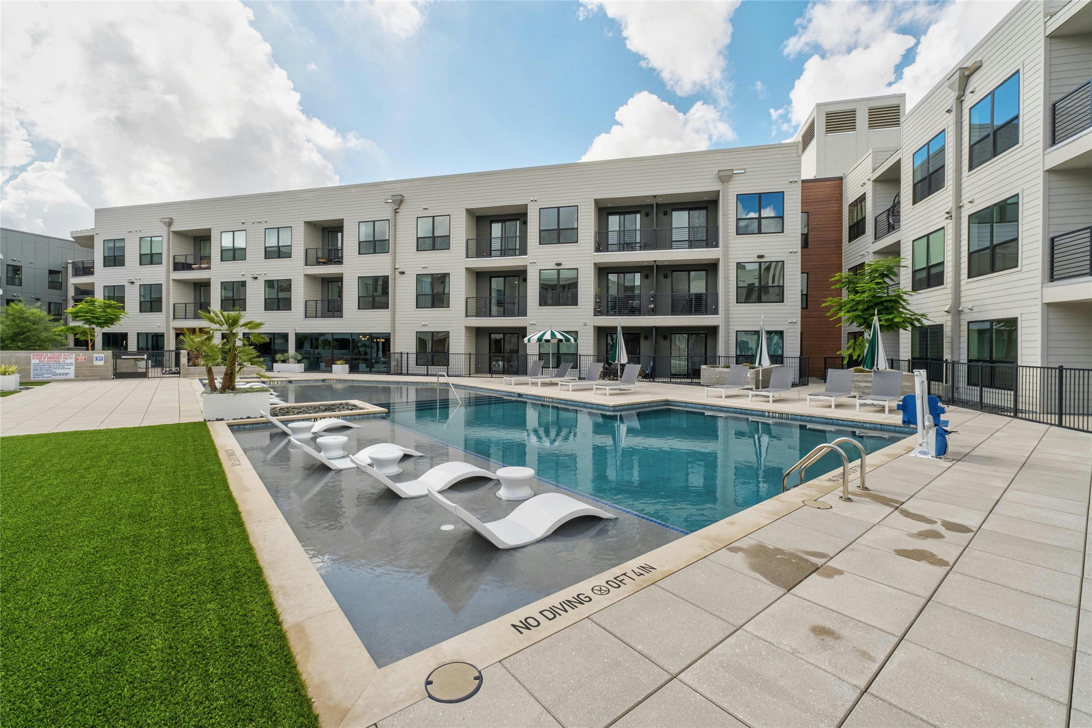 1701 Simond Avenue, Unit 644 Austin, TX 78723 - Photo 25 of 40 a swimming pool view with a outdoor seating