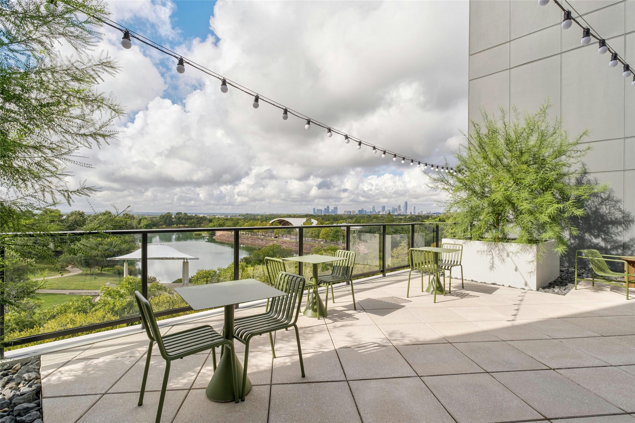 1701 Simond Avenue, Unit 644 Austin, TX 78723 - Photo 32 of 40 a view of a terrace with furniture and a lake view