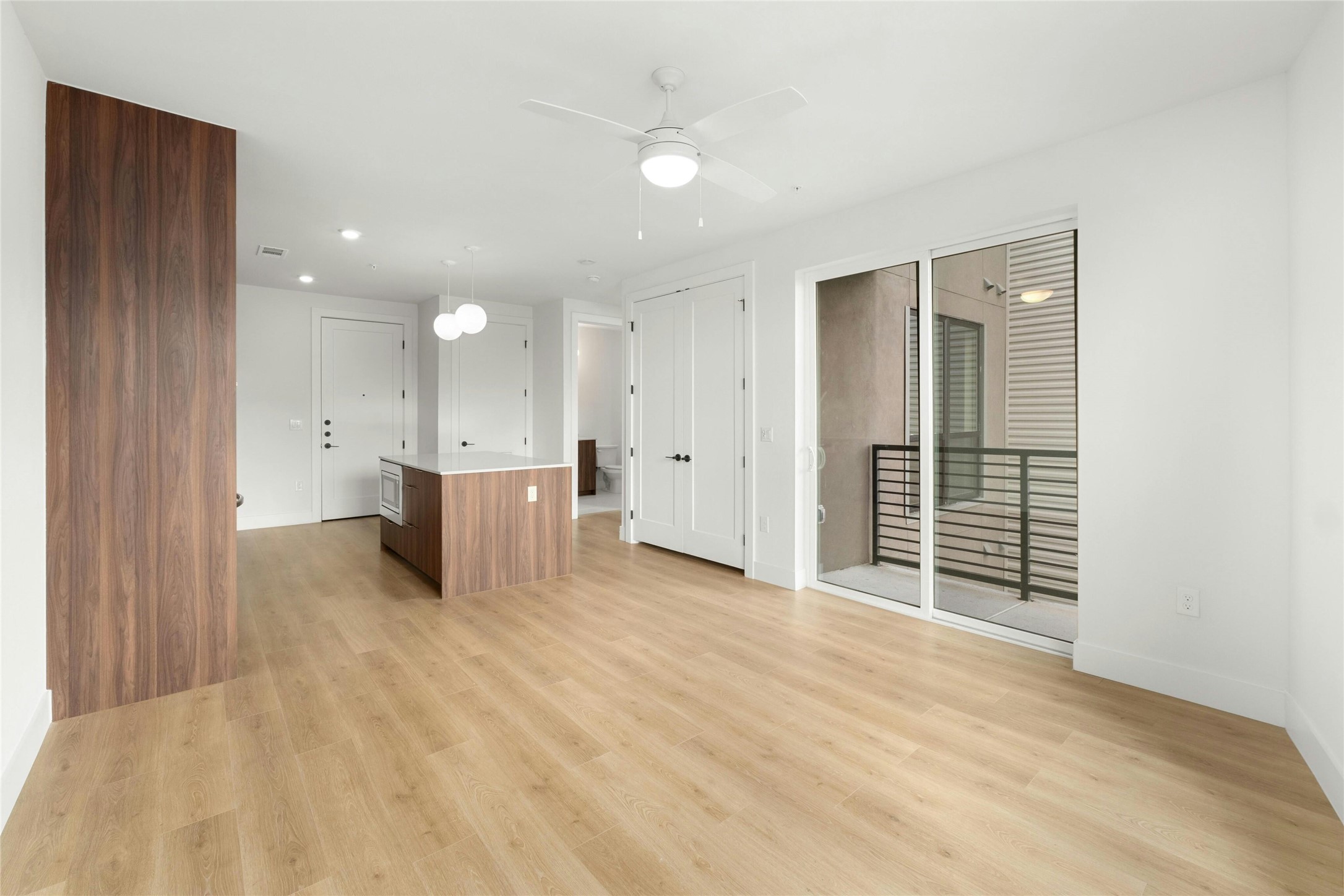 1701 Simond Avenue, Unit 644 Austin, TX 78723 - Photo 6 of 40 a view of a livingroom with a kitchen