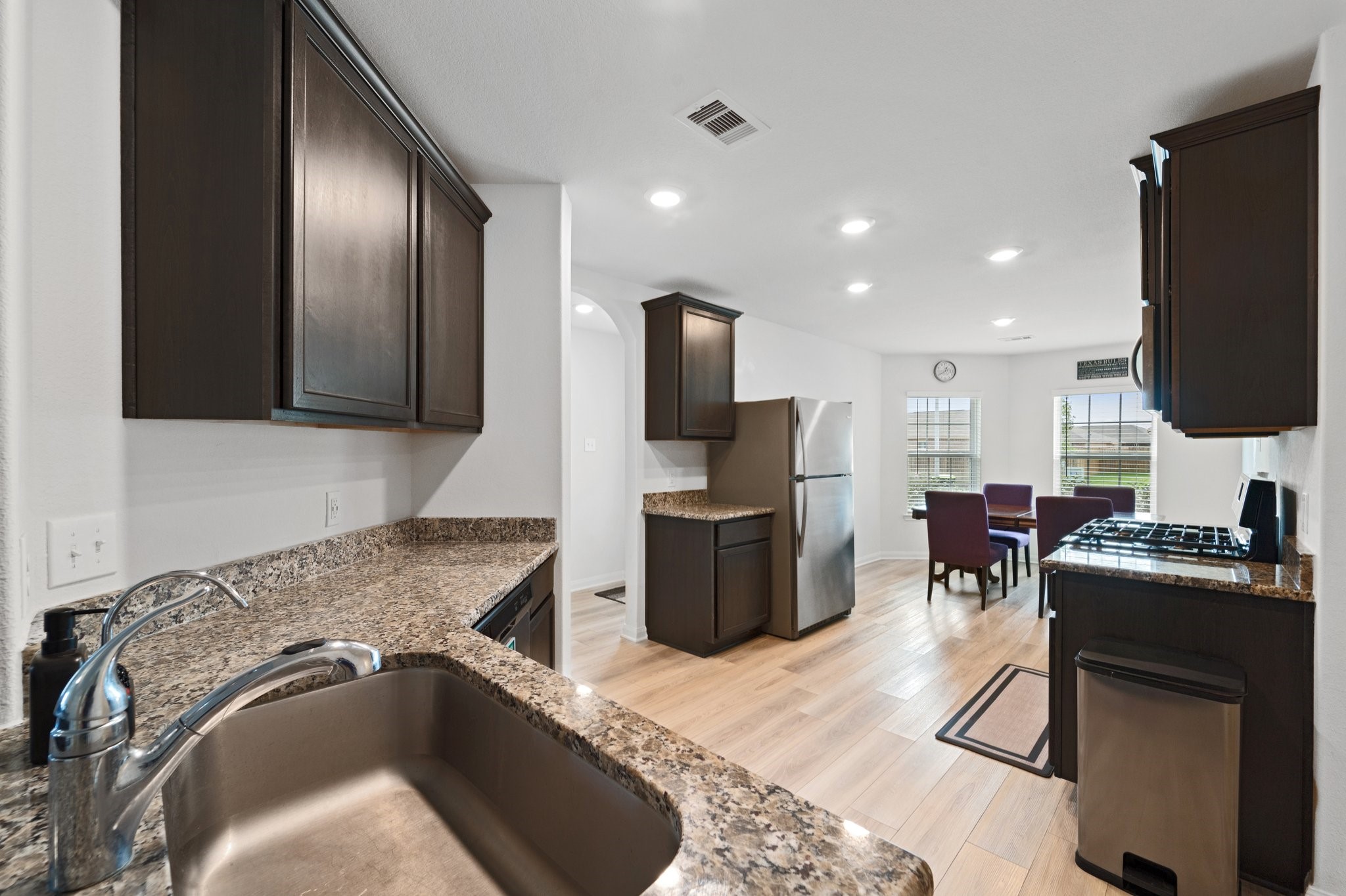 2148 Mule Ridge Drive Katy, TX 77493 - Photo 5 of 16 Full Kitchen View facing the front of the home - Cabinets have been well upkept.