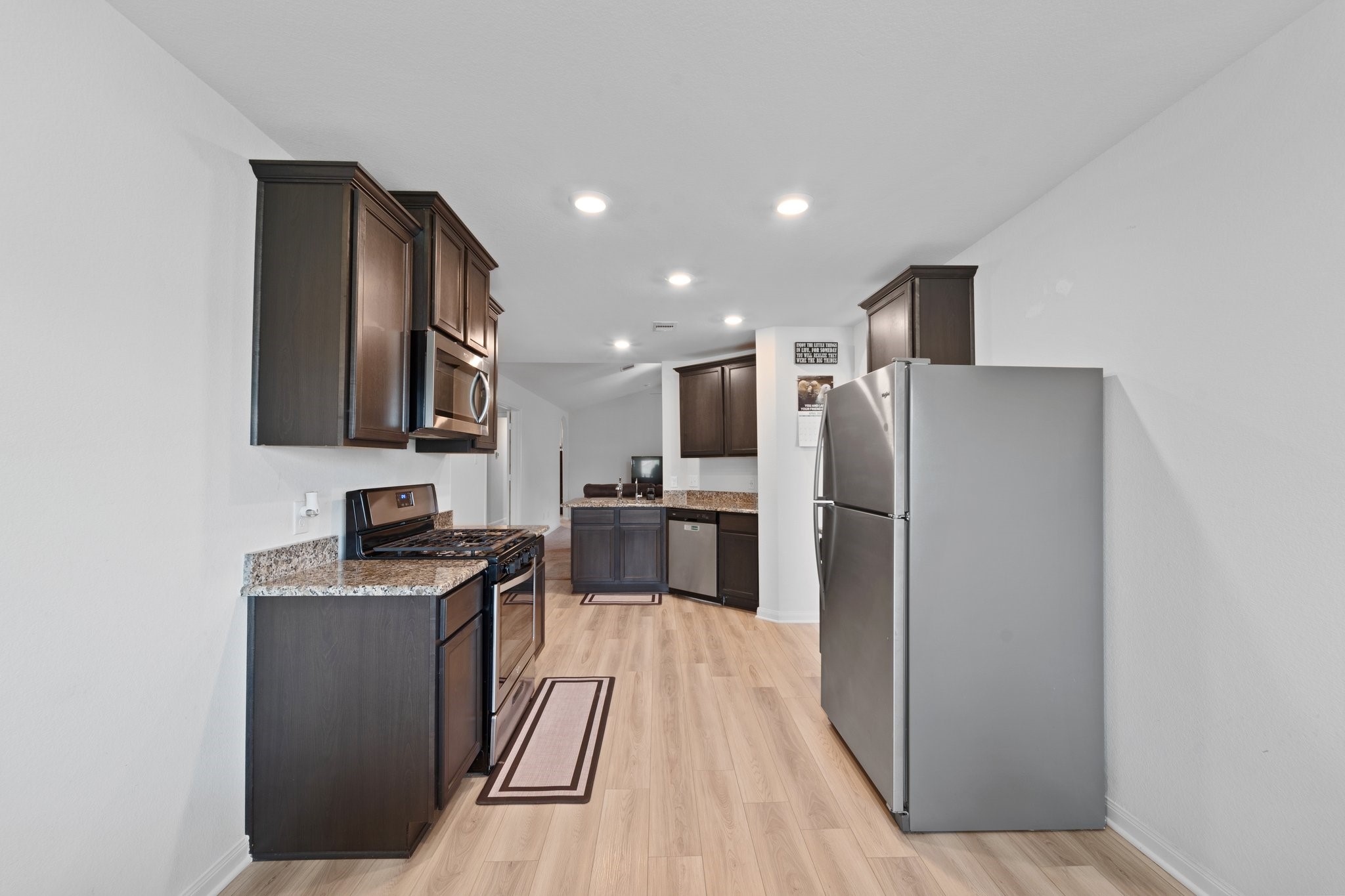 2148 Mule Ridge Drive Katy, TX 77493 - Photo 10 of 16 Kitchen is modern and open to the family room
