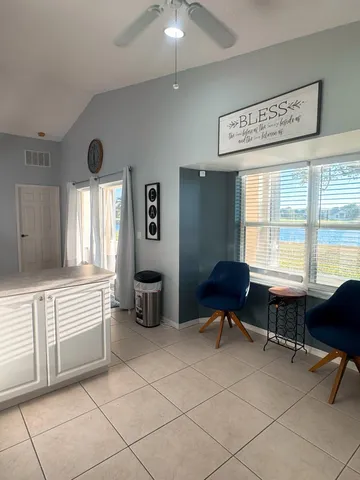 a workspace with furniture and a window