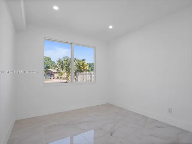 an empty room with a window