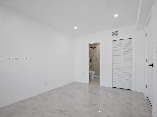 an empty room with closet