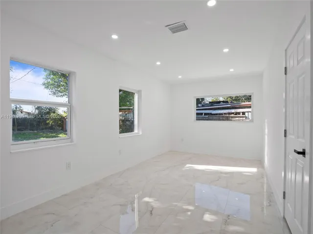a view of a hallway with workspace
