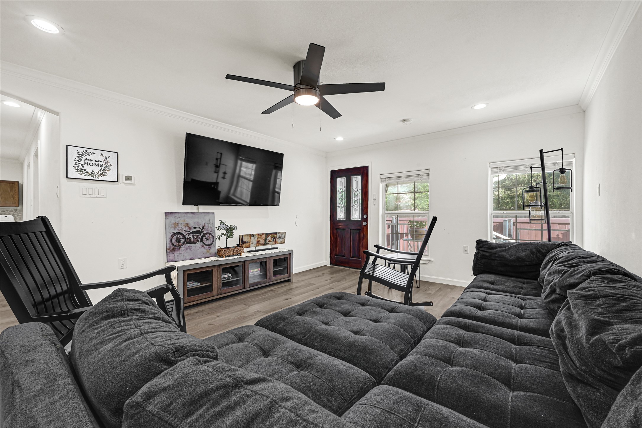 2809 Tooke Street Houston, TX 77023 - Photo 4 of 50 a living room with furniture and a flat screen tv