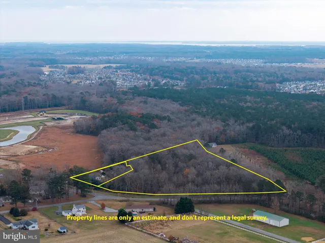 a view of a pool with a yard