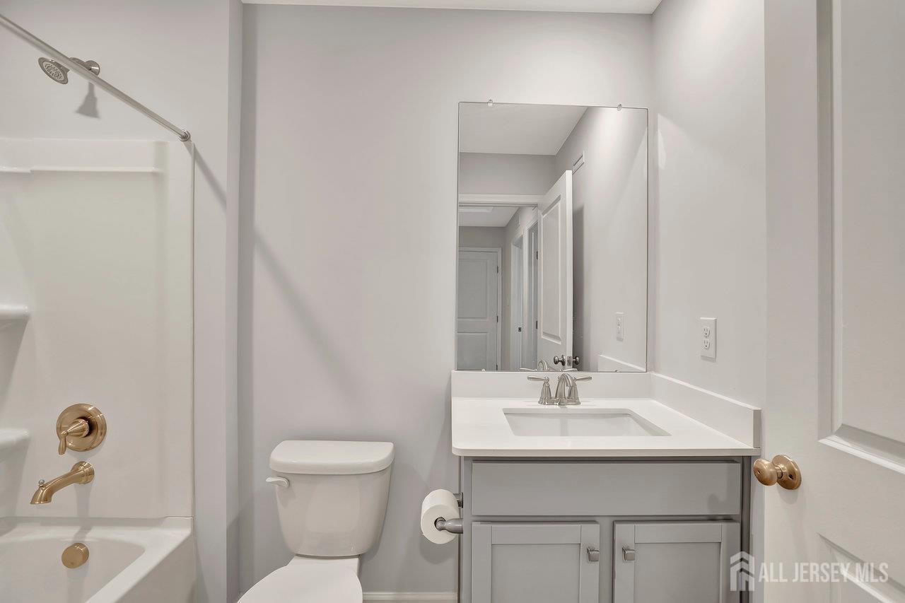 59 Alexander Way Westampton, NJ 08060 - Photo 15 of 18 a bathroom with a sink toilet and shower