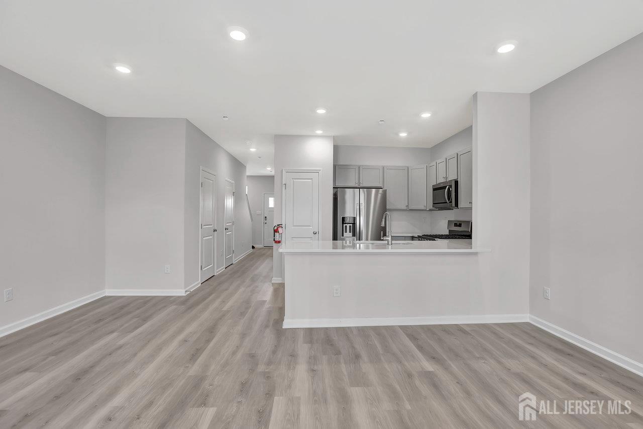 59 Alexander Way Westampton, NJ 08060 - Photo 3 of 18 a view of kitchen with wooden floor