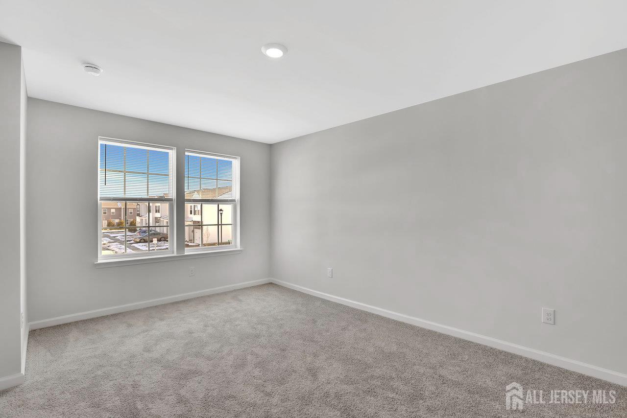59 Alexander Way Westampton, NJ 08060 - Photo 8 of 18 an empty room with a window