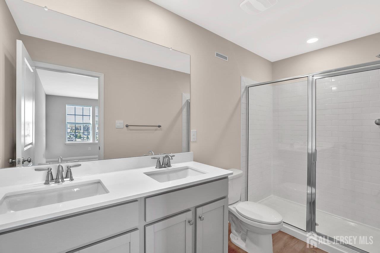 59 Alexander Way Westampton, NJ 08060 - Photo 10 of 18 a bathroom with a sink toilet and shower