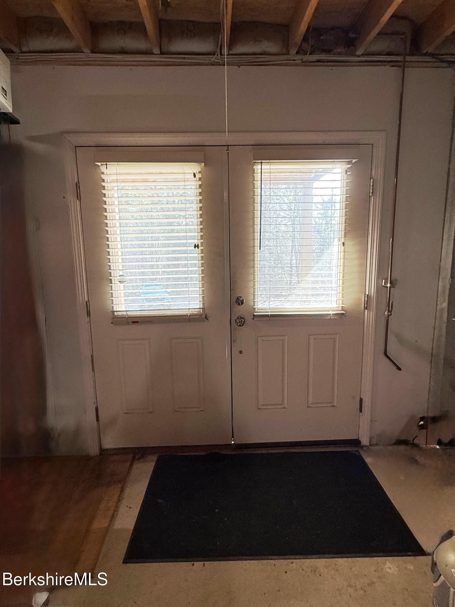 120 Rainbow Road East Otis, MA 01029 - Photo 25 of 32 double doors to under deck