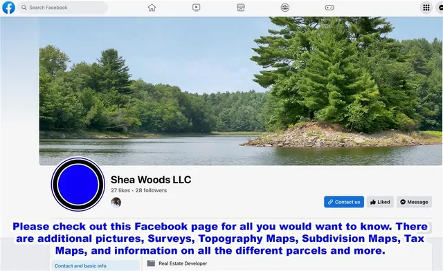 a sign that is sitting in a forest