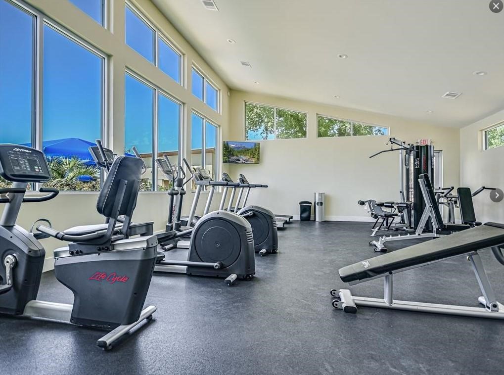 2524 Four Waters Loop Georgetown, TX 78628 - Photo 34 of 36 a room with gym equipment