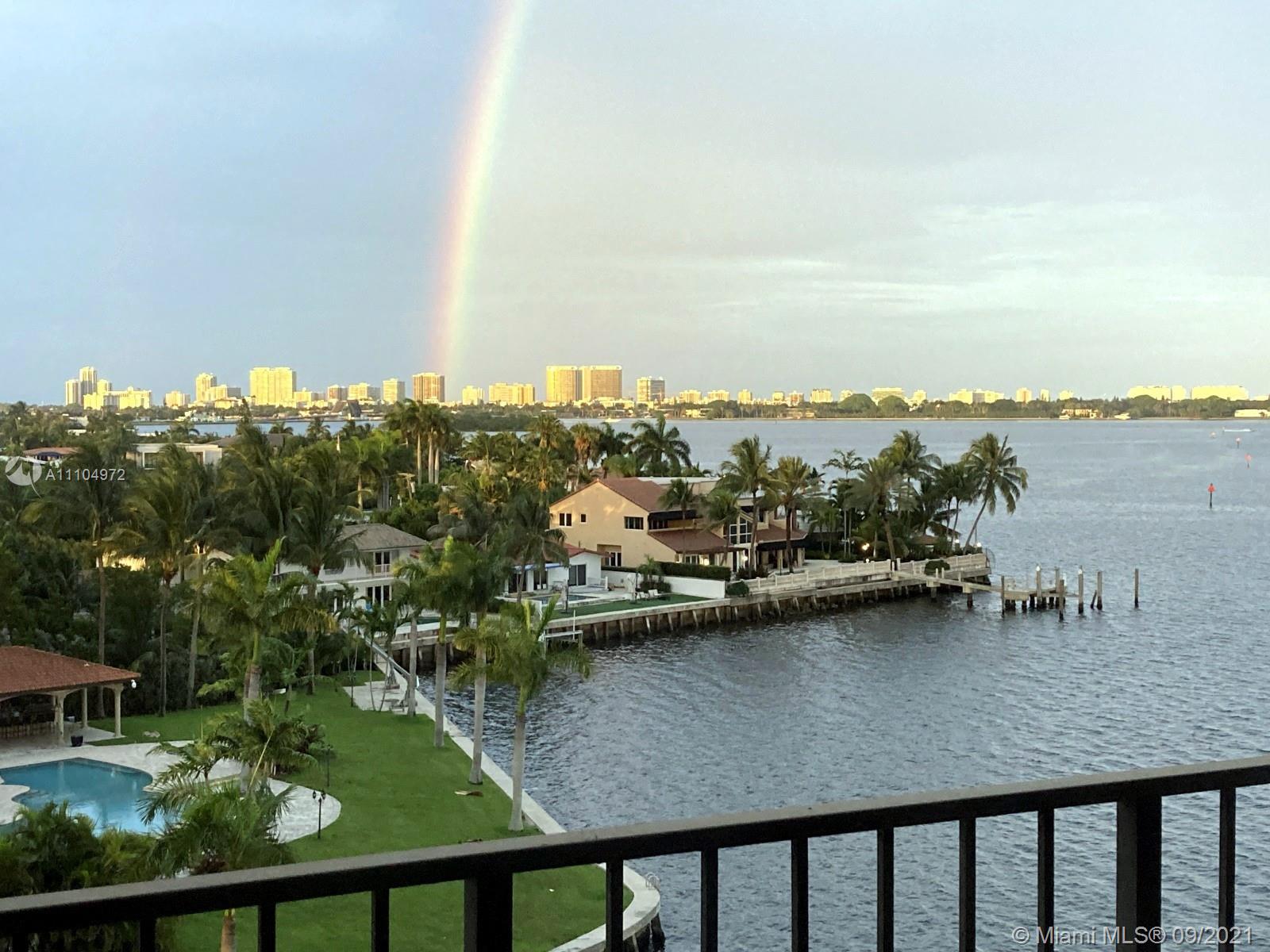 1800 Northeast 114th Street, Unit 703 Miami, FL 33181 - Photo 3 of 33 a view of swimming pool from a balcony