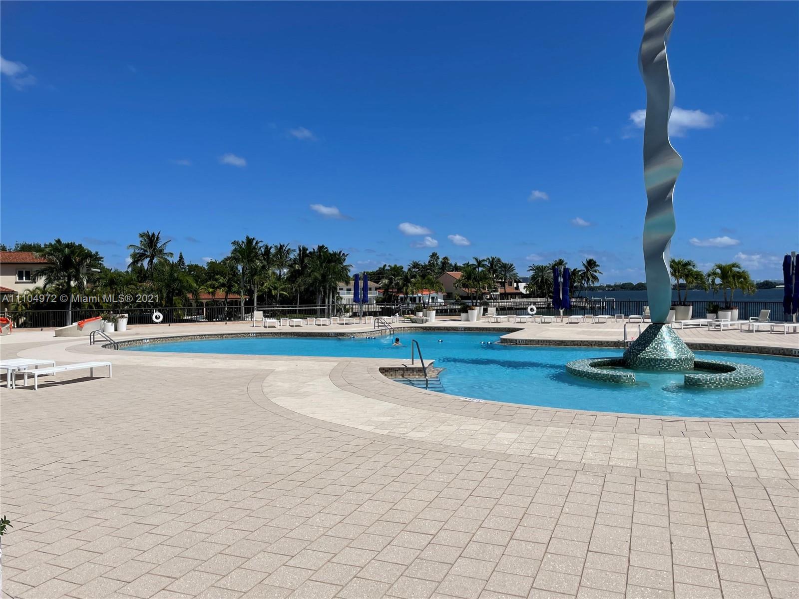 1800 Northeast 114th Street, Unit 703 Miami, FL 33181 - Photo 23 of 33 a view of a swimming pool and outdoor space
